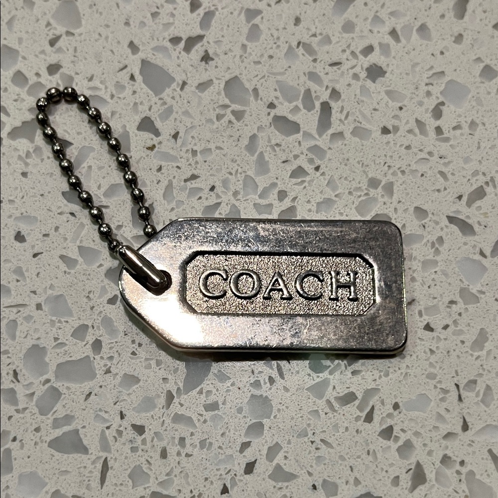 Coach Metallic Silver Keychain 2”x1”